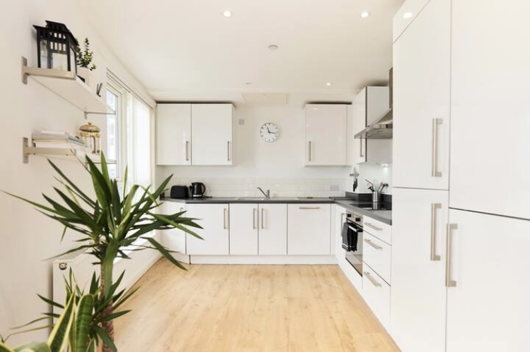 Modern kitchen in white with integrated appliances